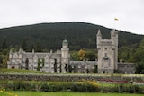 A picture of Balmoral Castle exterior with some colourful gardens