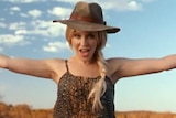 Kylie Minogue wearing an akubra in Australian tourism ad.