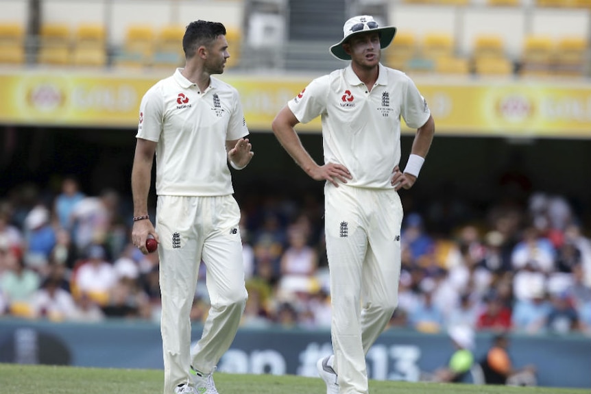 James Anderson and Stuart Broad in conversation on the field.