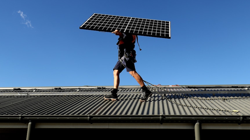 Solar panels being installed on a rooftop in Sydney