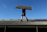 Solar panels being installed on a rooftop in Sydney