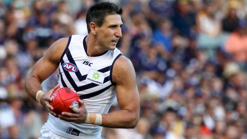 Matthew Pavlich on the ball for Fremantle against West Coast at Subiaco Oval on April 19, 2015.