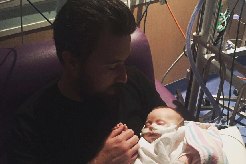 Maddy Black's son Felix in hospital as a three-month-old baby due to severe reflux.