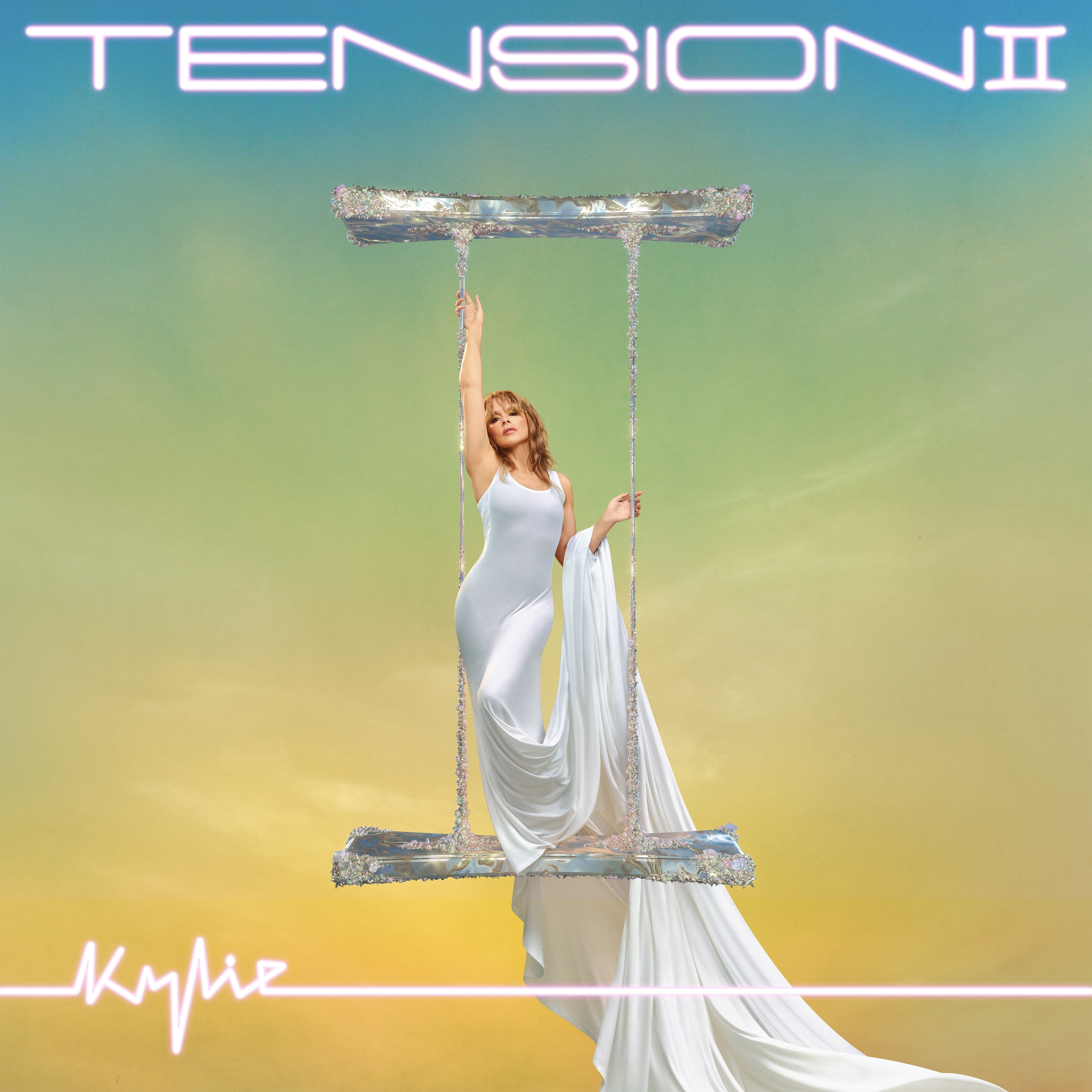 Album artwork of Kylie Minogue in long, draped white dress, suspended mid-air on crystal swing with text: Tension II - Kylie