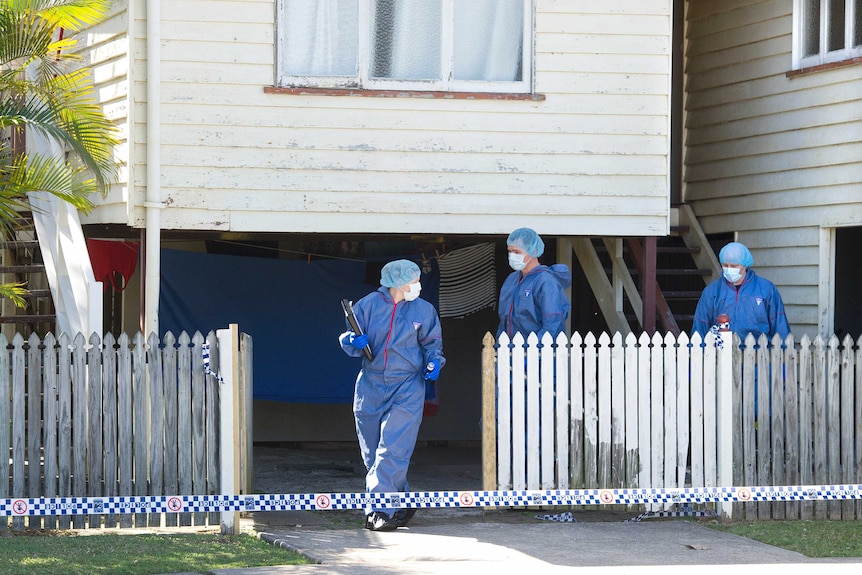 Forensic police at the house at Norman Park where the woman's body was found.