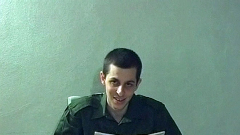 Gilad Shalit smiles briefly.