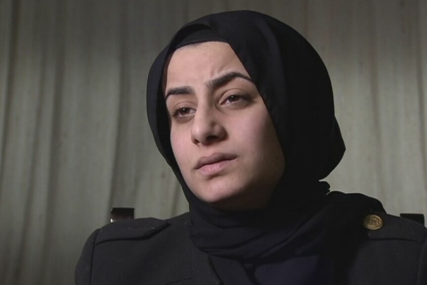 Layla Al Saabary, wearing black and looking sad, talks to the camera about her cousin of Zynab Al Harbiya.