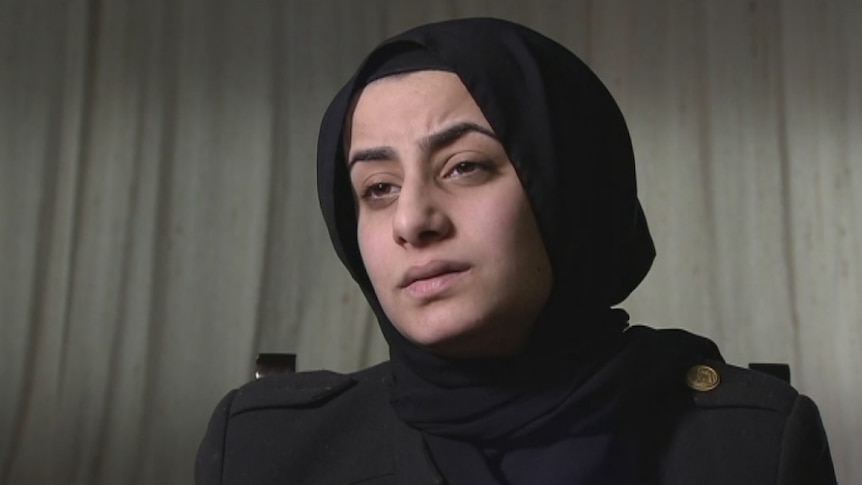 Layla Al Saabary, wearing black and looking sad, talks to the camera about her cousin of Zynab Al Harbiya.