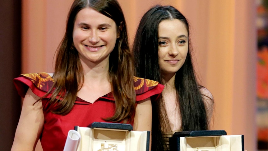 Best actress award winners Cristina Flutur (L) and Cosmina Stratan, at Cannes.