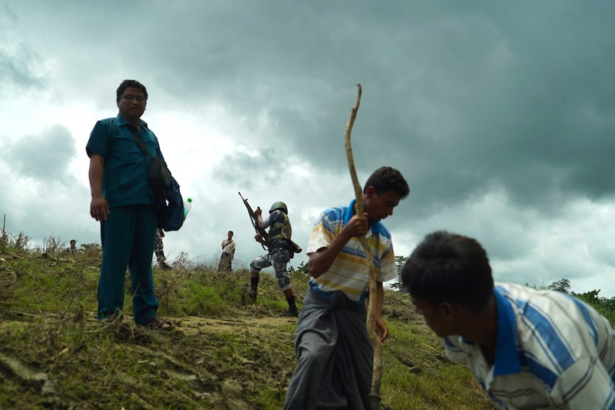 The army and the Border Guard Police oversee men in the northern Rakhine State, in Myanmar's west.