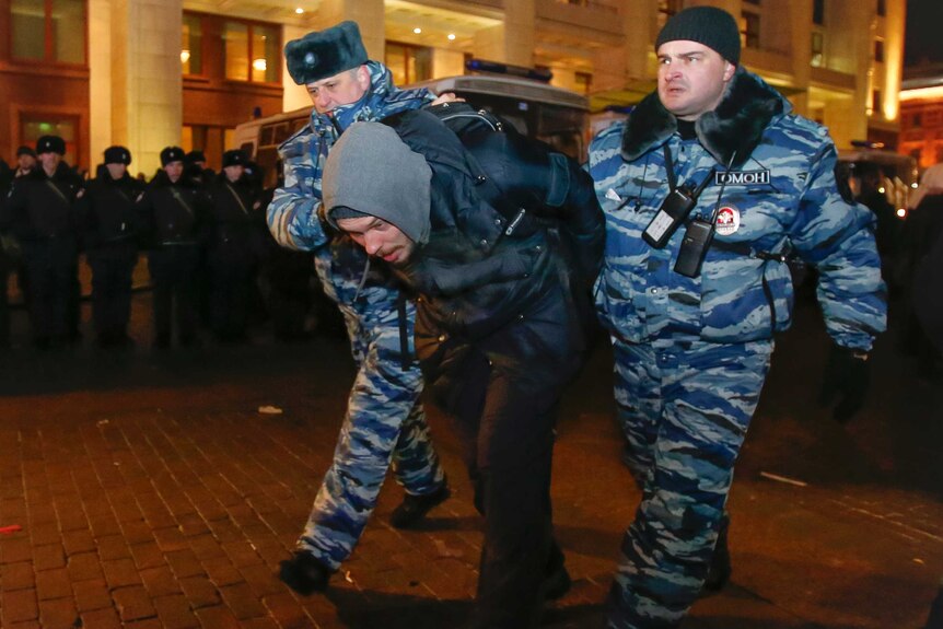 Russian opposition supporter detained at rally