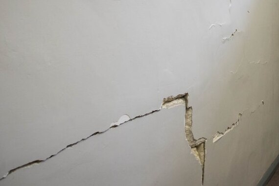 A deep crack reaches from the ceiling to the floor in Warracknabeal Secondary's worst classroom.