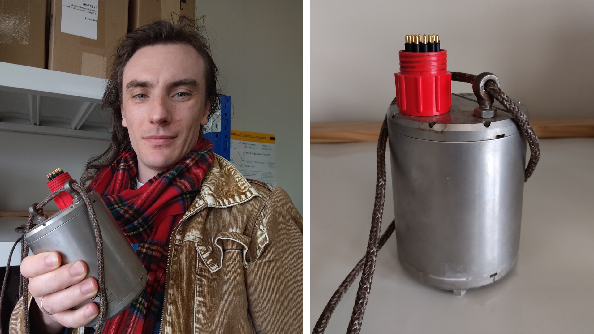 Rohan is wearing a red scarf and a brown jacket.  The device looks like a metal tin can with a red electronic connector on top