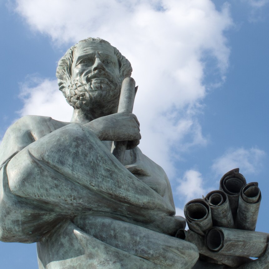 A marble statue of the ancient Greek philosopher Aristotle, viewed from below and set against a cloudy sky