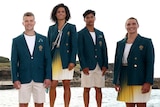 Nine Australian Olympians pose for photos in their outfits for the Paris Olympic Games opening ceremony.