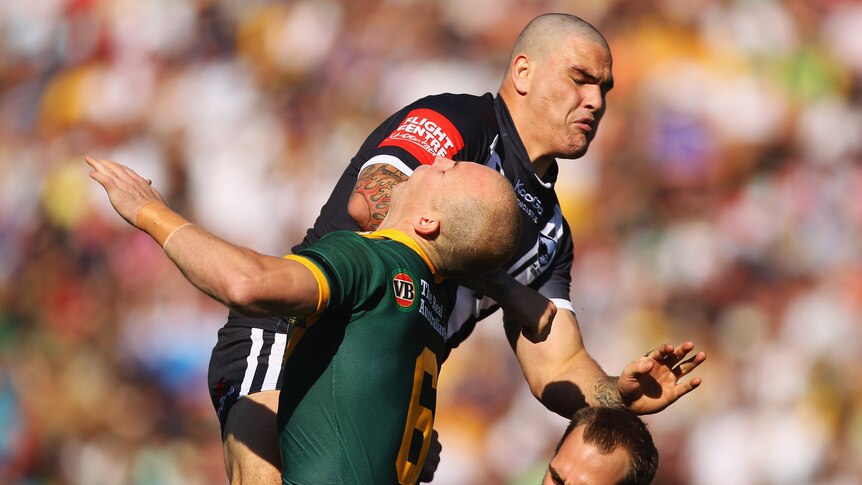 Late shot ... Russell Packer nailed Darren Lockyer after a kick in the opening exchanges on Sunday.