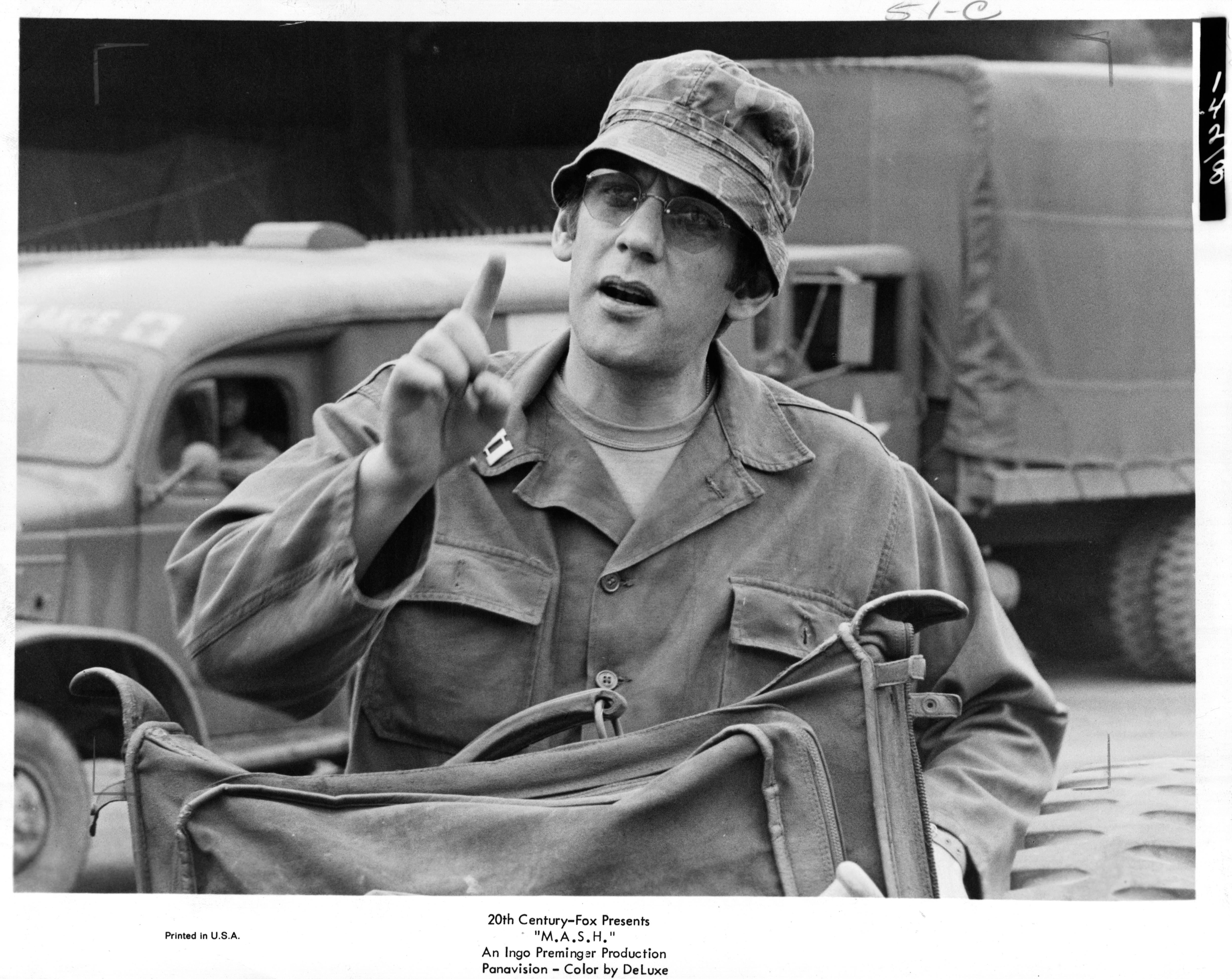 Donald Sutherland in MASH tv show pointing his finger at someone