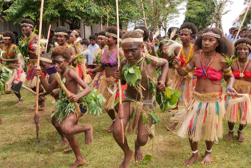 Manus Islanders, from young boys to women, join in a dance to welcome Sean Dorney.