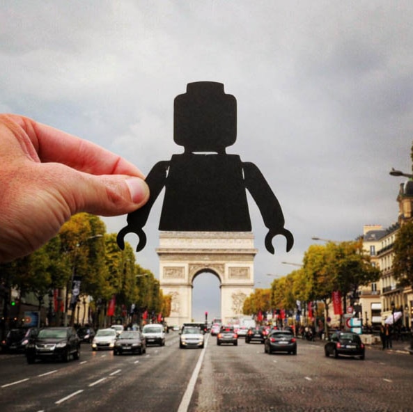 A photo of the Arc de Triomphe with a lego cutout
