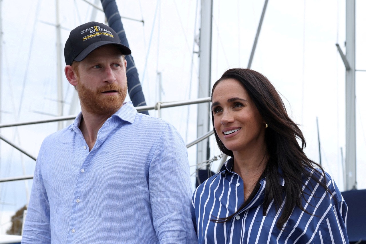 Prince Harry and Meghan arrive back in UK