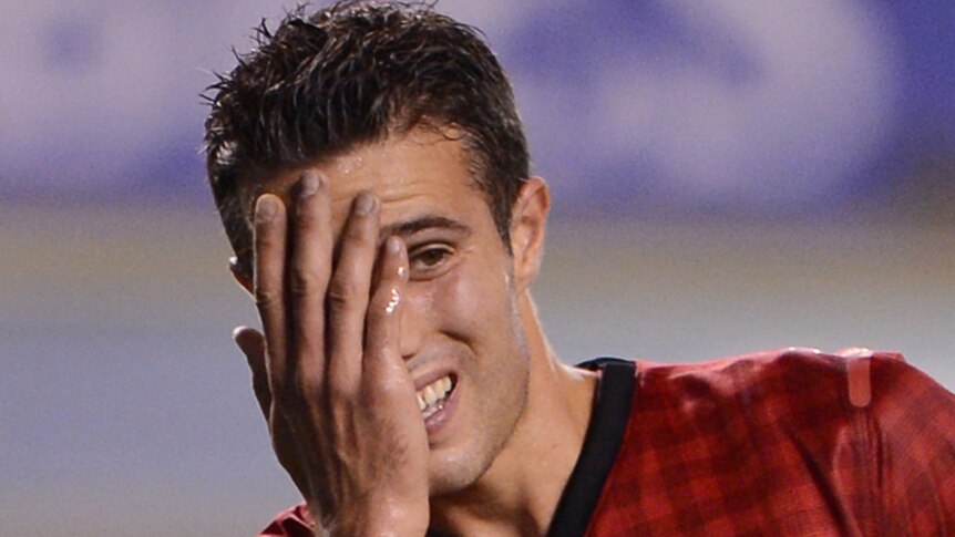 Not the best start ... Robin van Persie reacts during United's 1-0 loss to Everton.