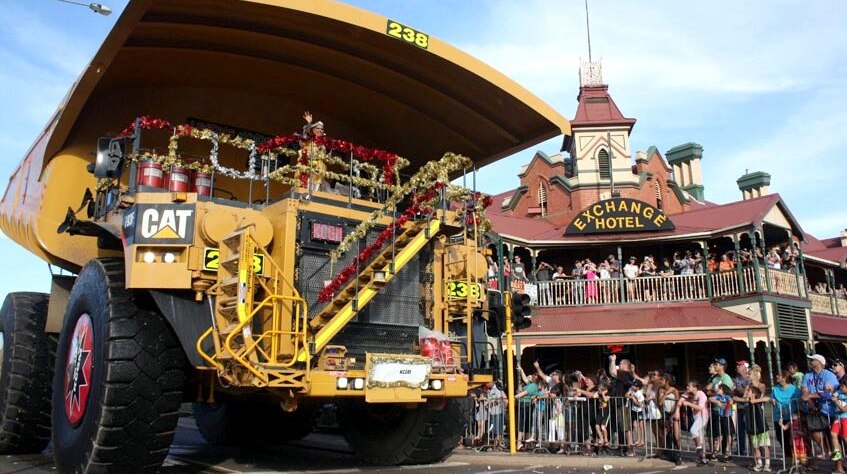 The Christmas fairy arrives on a 300-tonne mine truck during the St Barbara's parade.