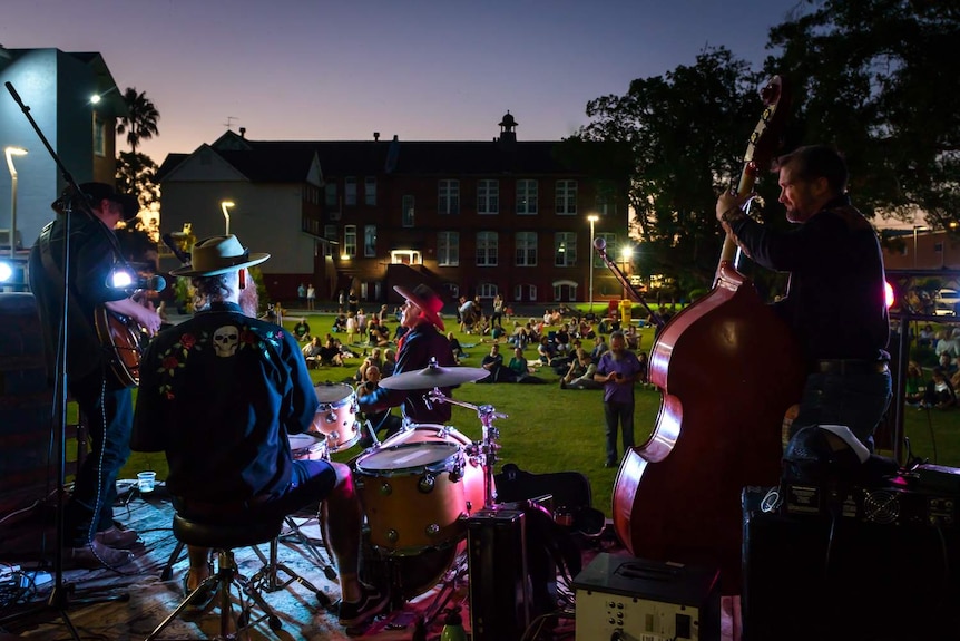 A crowd watches a band at The Quad in Lismore.