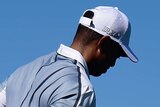 Tiger Woods holds his back during the PGA Tour event at Torrey Pines on February 5, 2015.