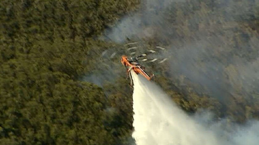 The Rural Fire Service is continuing to water bomb two large blazes.