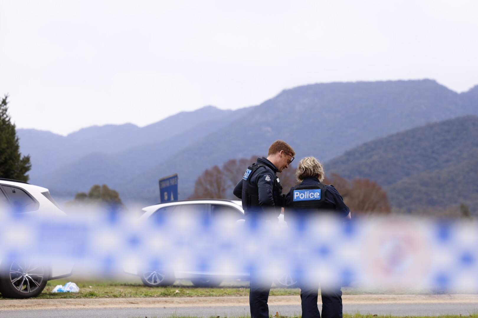 Police hunt 'heavily armed' gunman after two police officers fatally shot