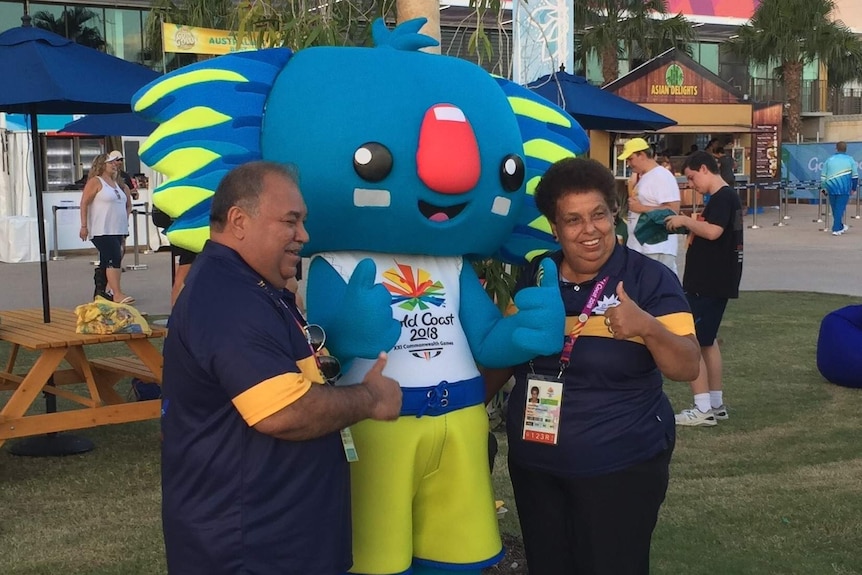 President Waqa (L) stands with a mascot at the Commonwealth Games on the Gold Coast in 2018.