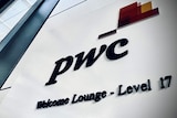 A PwC logo on the side of a building.