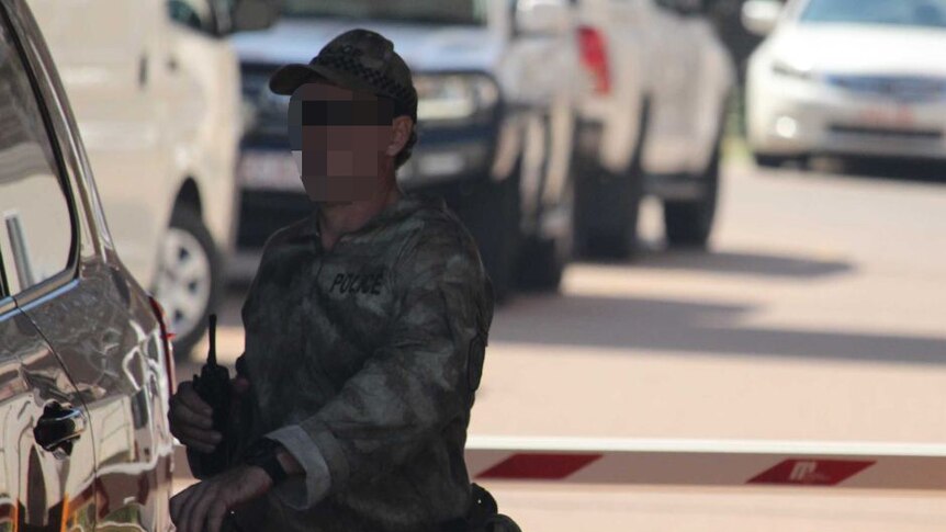 A Tactical Response Group officer outside the Royal Darwin Hospital
