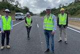 Local politicians Chris Gulaptis and Kevin Hogan on a new section of the Pacific Highway