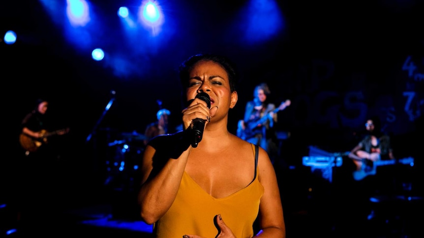 Ursula Yovich performing on stage in a production of Barbara and the Camp Dogs