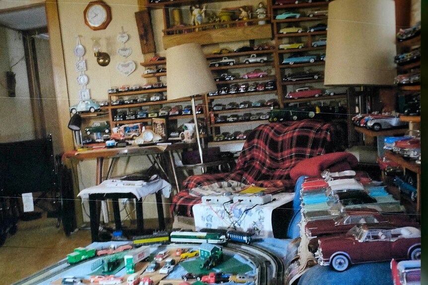 Geoffrey Holt's vast model car and train collection displayed in his trailer.