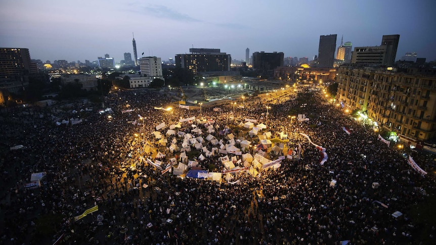 Tens of thousands people take part in a mass rally against a decree by president Mohamed Morsi granting himself broad powers.