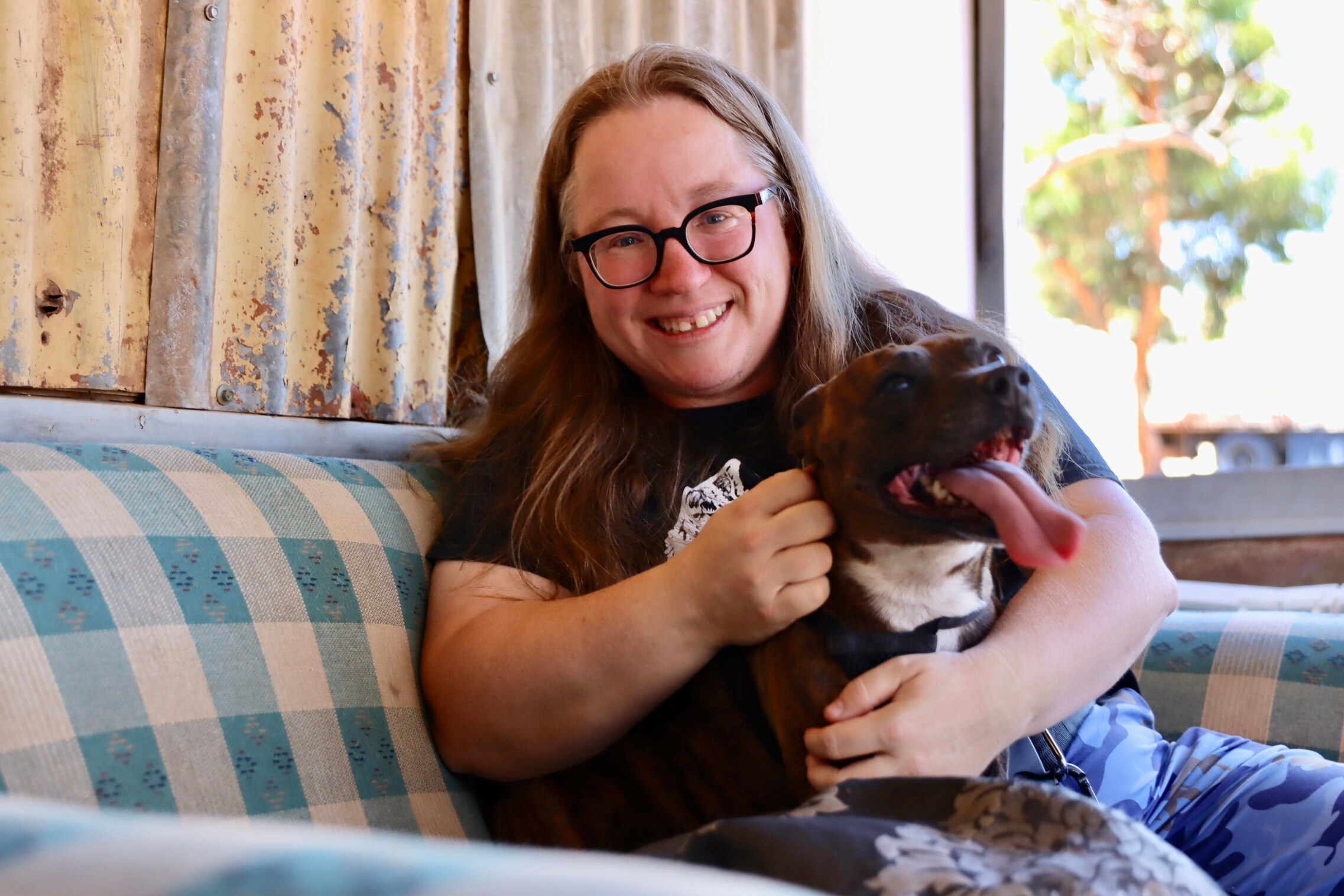woman and dog on the couch