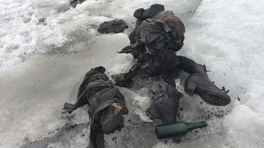 Shoes and clothing are visible at a Swiss glacier where two bodies were found.