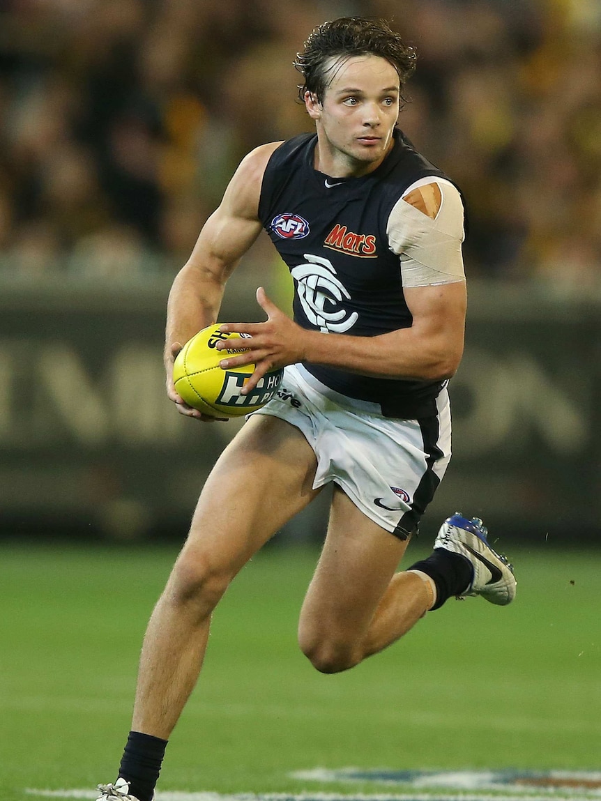 Dylan Buckley makes a run for Carlton