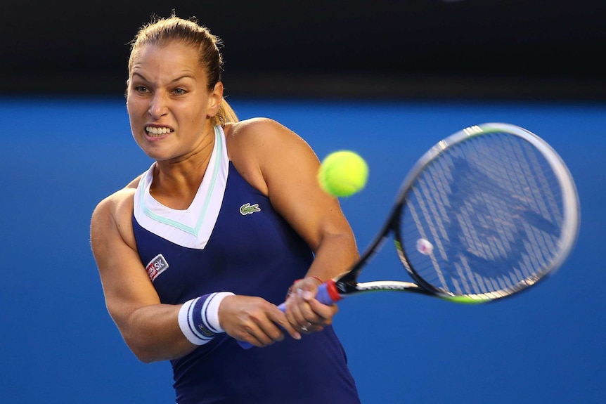 Gutsy display ... Dominika Cibulkova plays a backhand against Li Na