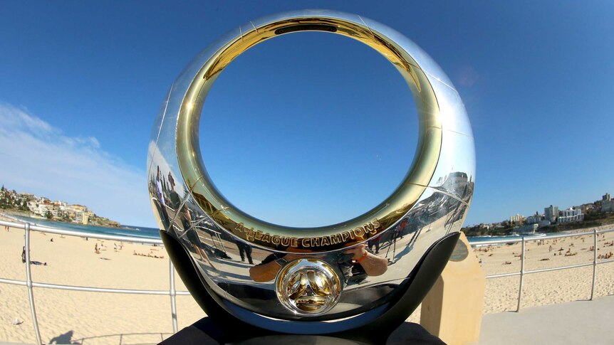 The A-League Premiers Championship Trophy set up for photos at Bondi Beach.