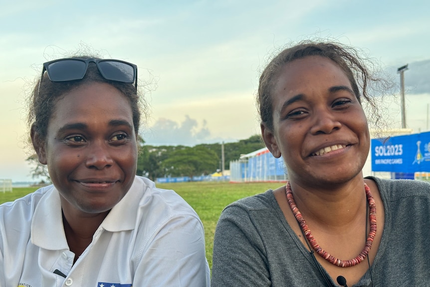 Two Solomon Islander twins smiling.