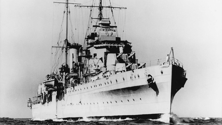 A black and white photo of the ship HMAS Perth during World War Two.