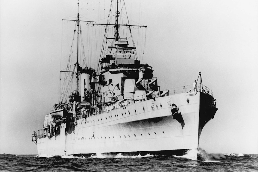 A black and white photo of the ship HMAS Perth during World War Two.