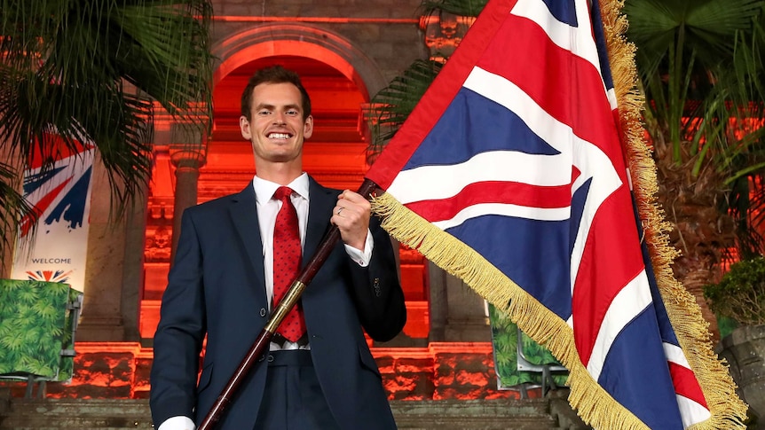 Andy Murray holding his nation's flag
