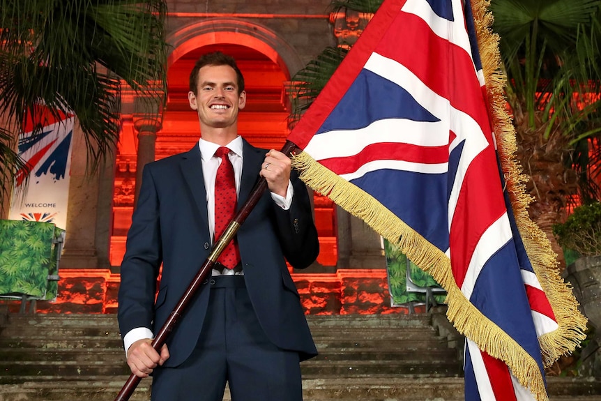 Andy Murray holding his nation's flag