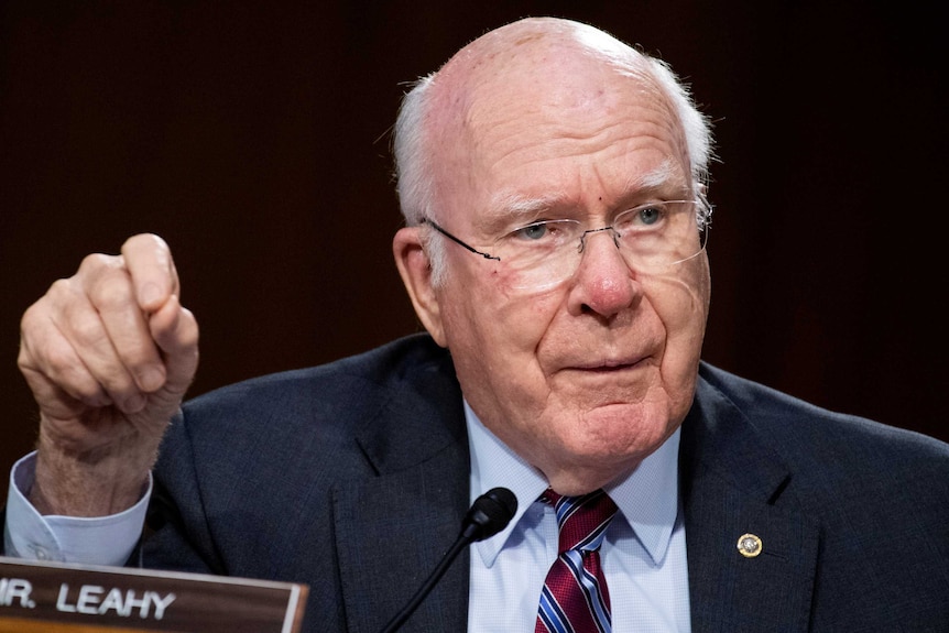 A close up of Patrick Leahy speaking into a microphone.