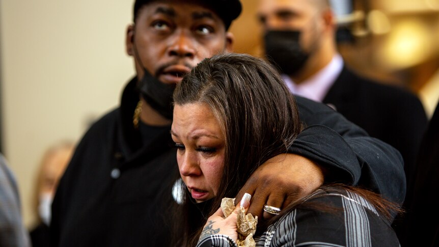 Daunte Wright's parents cry as they leave the court room.