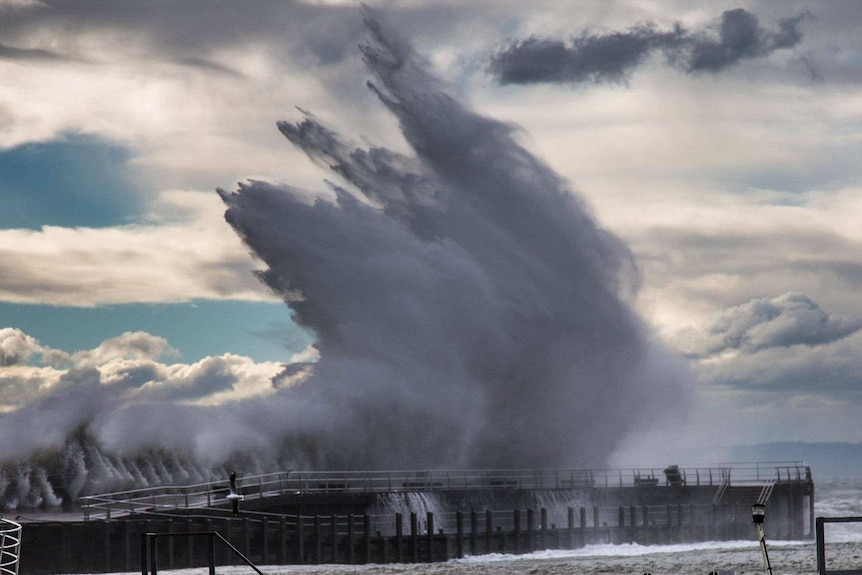 Waves smashing into the Mornington Peninsula Pier